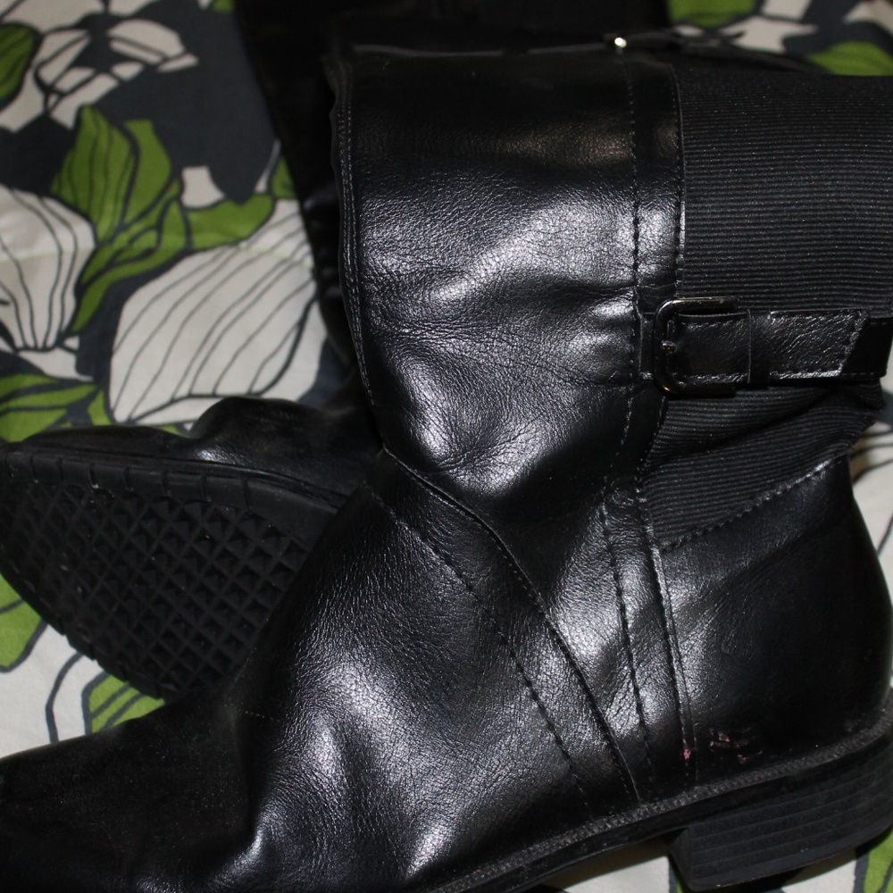 Tall Black Boot leg.